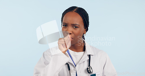 Image of Sick, cough and portrait of a black woman or doctor for healthcare, virus or medical problem. Nurse, hospital and an African medical employee with covid, asthma or flu on a blue background in studio