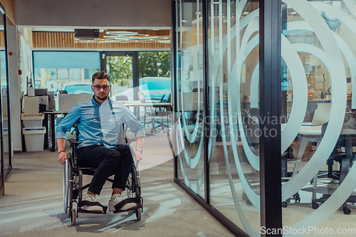 Image of In a large modern corporation, a determined businessman in a wheelchair navigates through a hallway, embodying empowerment and inclusivity in the corporate world.