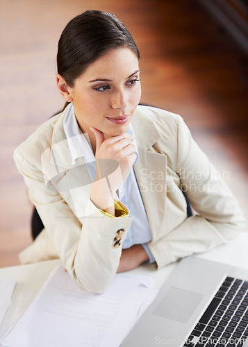 Image of Business woman, thinking and planning on computer for Human Resources decision, career solution or office research. Professional worker on laptop, reading payroll information or analysis of software