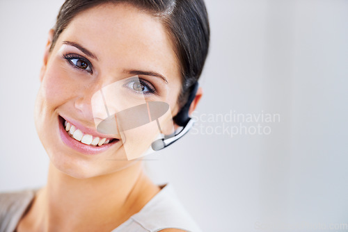 Image of Business woman, call center portrait and customer service, e commerce or telemarketing on a white background. Face of consultant, advisor or agent in headphone in virtual chat or contact us in studio