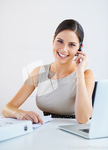 Image of Office woman, call center portrait and documents or laptop for communication or support on a wall or white background. Face of business consultant or advisor in headphone for virtual chat or contact