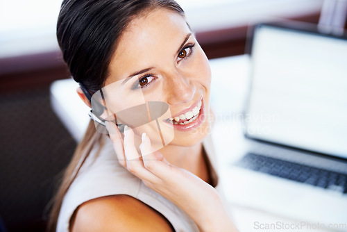 Image of Call center, woman and portrait in office for communication, telecom questions and customer service support at laptop. Face, happy telemarketing agent and receptionist with microphone for CRM contact