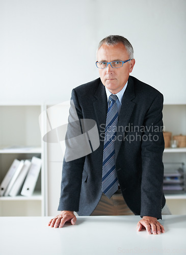 Image of Portrait, management and a serious senior man in an office as the CEO of a corporate company. Business, leadership and a confident manager in a professional workplace for future growth or development