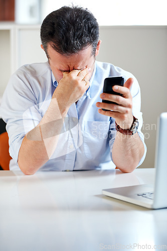 Image of Business man, laptop and phone with stress, headache and thinking for finance review, mistake or tired. Accountant, pc and smartphone with burnout, fatigue or mental health with fail, glitch or error