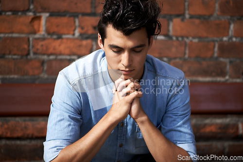 Image of Man, hands and meditation or praying for faith, worship and spirituality for soul, support and belief. Male person, confession and hope for forgiveness from god, gratitude and trust in religion