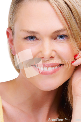 Image of Portrait, smile and beauty with a woman closeup in studio isolated on white background for natural wellness. Face, skincare and a happy young model looking confident with her cosmetic skin aesthetic