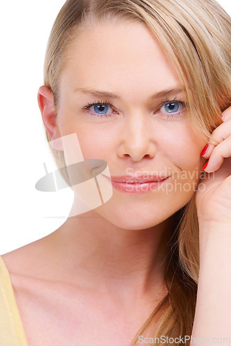 Image of Portrait, beauty and skincare with a blue eyes woman closeup in studio isolated on a white background. Face, aesthetic or wellness with a natural young model looking happy with her skin treatment