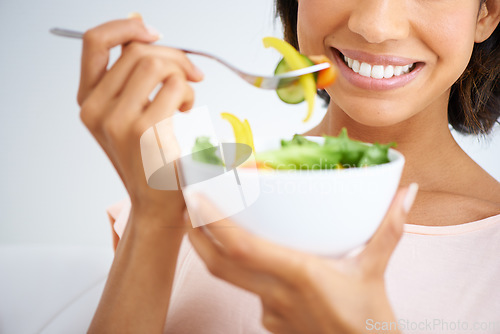 Image of Smile, health and closeup of woman with salad in studio with vegetables for wellness, organic or diet. Happy, nutrition and zoom of female person eating healthy meal with produce by white background.
