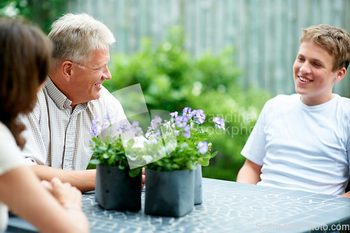 Image of Grandparents, boy and outdoor with smile, backyard and home with family, teenager and garden. Retired, man and woman with conversation, happiness and child for bonding together, support and relax