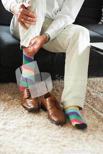 Image of Businessman getting ready, shoes and socks on carpet in home, putting on business fashion and start to day. Man dressing for work in morning, feet on floor with style and wardrobe for office career.