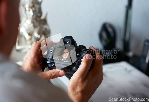 Image of Camera, person or hands of photographer in home with creativity in pictures or photo in Italy. Photography, screen or closeup of man with art after photoshoot production for editing review or memory