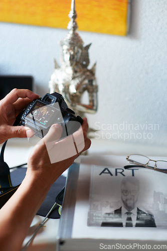 Image of Camera screen, man or hands of photographer in home with creativity in pictures or photo results. Photography, blog or closeup of man with art after photoshoot production for editing review or memory