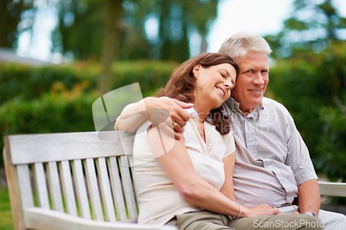 Image of Park, portrait or happy couple hug on bench for support, trust or hope in commitment together in nature. Smile, garden or senior man bonding to relax with a mature woman on holiday for love or care