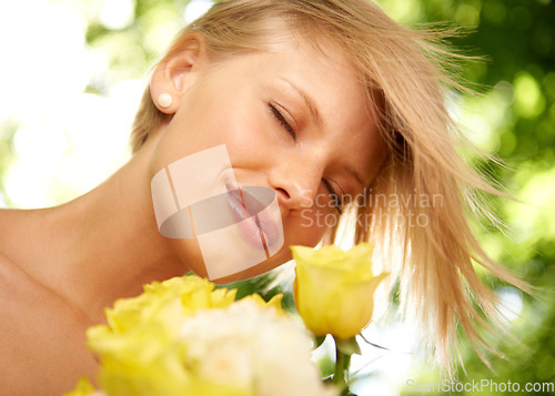 Image of Thinking, nature and happy woman in garden with flowers for holiday in spring in outdoor floral forest. Smile, calm and face of girl smelling roses in countryside in sunshine on vacation to relax.