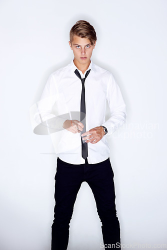 Image of Portrait, serious and business man with tie in studio isolated on a white background in office on mockup space. Confidence, professional entrepreneur and worker, consultant and agent in Australia