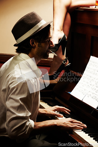 Image of Profile, artist and man with piano, smoking and music with sound, smoker and entertainment with performance. Person, player or musician with jazz, performer and listening with cigarette or instrument
