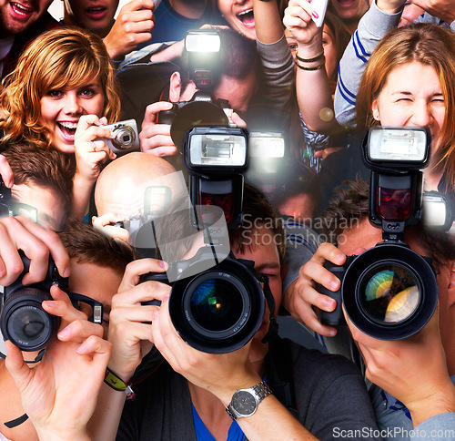 Image of For the love of celebrity. A group of paparazzi and fans going hysterical - This is a highly retouched image and may not be a good option for a large poster project.