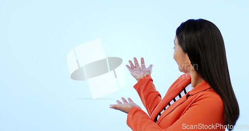 Image of Business woman, presentation and space in studio for mockup, promotion and hands by blue background. Entrepreneur, show and information with speech, opinion or advice with discussion for advertising