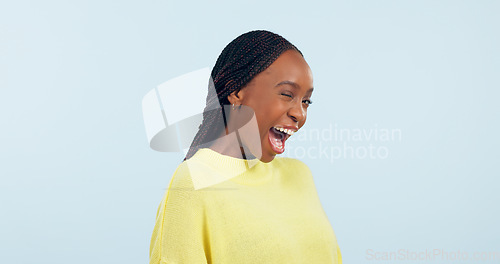 Image of Wink, flirty and portrait of a black woman on a studio background for love, conversation or a smile. Happy, mockup space and an African person with facial expression for a secret or confident