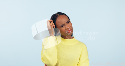 Image of Confused woman, scratch head and thinking in studio of questions, solution and dont know why on blue background. Curious african model with doubt of decision, forgot memory and problem solving ideas