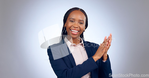 Image of Business, success and face of black woman with applause in studio with congratulations, pride or praise on grey background. Portrait, smile or lady entrepreneur with clapping hands emoji motivation