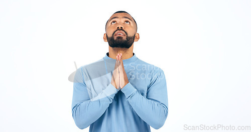 Image of Worship, prayer and man praying in studio for thank you, faith or help on white background. Jesus Christ, hope and male model in prayer, trust or praise, gratitude or guidance, holy or gospel peace