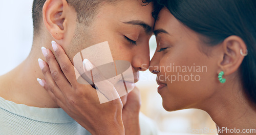 Image of Face, love and relax with a couple closeup in their apartment together for care, romance or bonding. Trust, support or commitment with a happy young man and woman in their home on the weekend