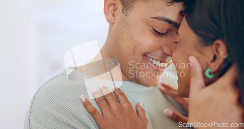 Image of Face, love and smile with a couple closeup in their apartment together for care, romance or bonding. Relax, support or touching moment with a happy young man and woman in their home on the weekend