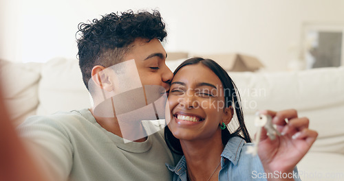 Image of House, keys and couple kiss selfie with smile and excited from real estate investment in a home. Happy, love and achievement with picture for social media post and memory from mortgage and success