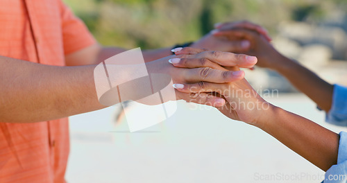 Image of Zoom, love and couple holding hands at a beach with respect, gratitude and trust in nature together. Commitment, closeup and people together at sea with support, kindness and summer travel freedom