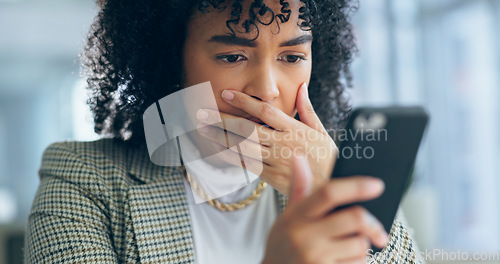 Image of Business woman, reading phone and shocked for news, social media post or marketing error in office. Young african employee confused, surprise and stress on mobile for scam, mistake or wrong email