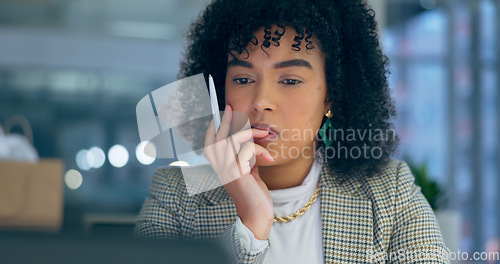 Image of Businesswoman, thinking and late at work in office by looking, reading or reviewing email. Anxious mexican person, manager or consultant with idea, pen or changes for online, technology or internet