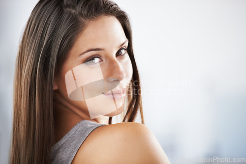 Image of Portrait, skincare and woman with mockup for wellness, cosmetics or natural beauty on blurred background. Face, smile and female model with result satisfaction, glowing skin or dermatology shine