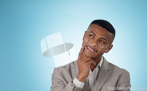 Image of Business, man and thinking at space in studio of ideas, future and memory on mockup blue background. Happy worker dream of decision, planning solution or insight to questions, brainstorming or choice