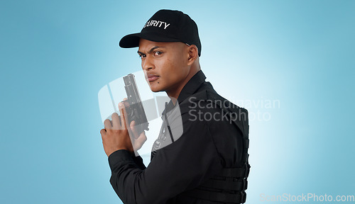 Image of Man, security guard and holding gun for shooting, protection and hands with face, portrait or confident. Safety, service or weapon for criminal, law or studio background for pistol, crime or eyes