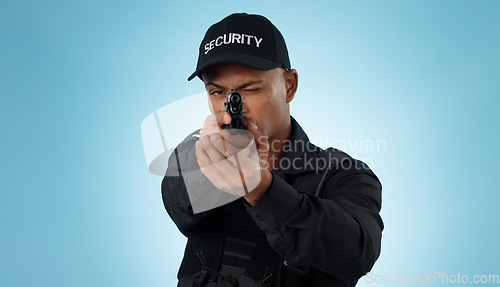 Image of Man, security guard and pointing gun to aim, protection and hands with face, portrait or confident. Target, killing or weapon for criminal, murder or studio background for pistol, crime or eye closed