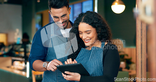 Image of Cafe, business owner and teamwork on tablet for barista training, review sales and online management in hospitality. Happy woman, manager or waiter typing on digital technology for menu or planning