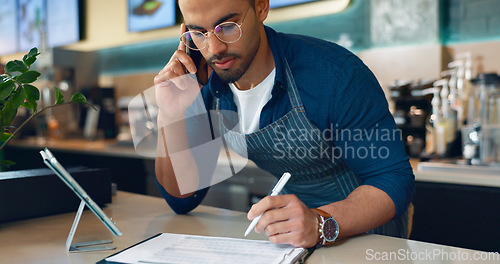 Image of Barista, phone call and paperwork for restaurant, cafe logistics or coffee shop management. Supply chain checklist, manager writing or man in mobile communication for stock inventory in startup