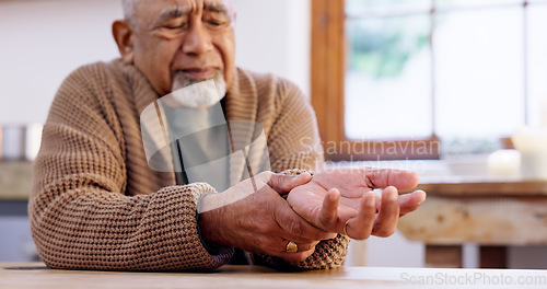 Image of Senior man, wrist or pain with hand, inflammation and tendinitis for arthritis, frustrated and unhappy. Health issue, retired and sick for sprain, upset and ache for osteoporosis, injury and hurt