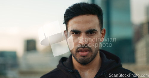 Image of Exercise, city portrait and man serious, determined and ready for cardio, workout commitment or sports. Face sweat, mockup space and outdoor athlete, runner or person for marathon training challenge