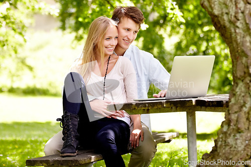 Image of Park, laptop or relax couple smile, reading or watch online movie, social network post or video in natural nature garden. Bench chair, computer or spring wellness man, woman or people streaming media