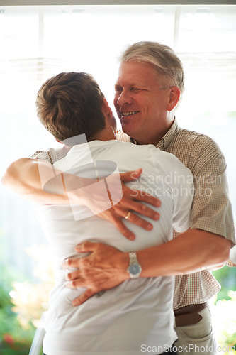 Image of Grandfather, teenager and hug with smile, family and embrace with love, grandchild and home. Grandparent, support or bonding together for relationship, happy and retired with boy, house or senior man