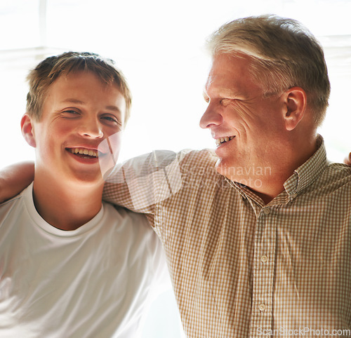 Image of Grandfather, teenager and hug with smile, happy and embrace with love, grandchild and home. Grandparent, support or bonding together for relationship, family or retired with boy, house or senior man