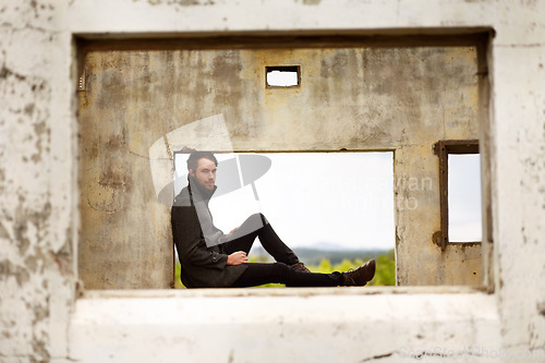 Image of Man, frame and travel by ruin house, relax and chilling by remains of building, smile and portrait. Happy male person, historic site and vacation for culture, history and tourism in Machu Picchu