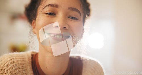 Image of Happy, smile and face of a woman at her home with a sweet, positive and confident personality. Happiness, excited and headshot portrait of a calm young female person alone in her modern apartment.