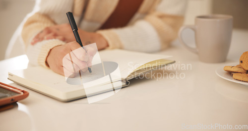 Image of Woman, notebook and hands writing in home for journal, day schedule and checklist with planning. Study notes, creative ideas and writer with letter, reminder and story draft in a house with paper