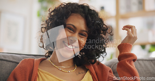 Image of Couch, hair and portrait of happy woman relax in a home with natural hairstyle in a home or apartment with smile. Haircare, beauty and confident young person on a sofa in Brazil in a living room