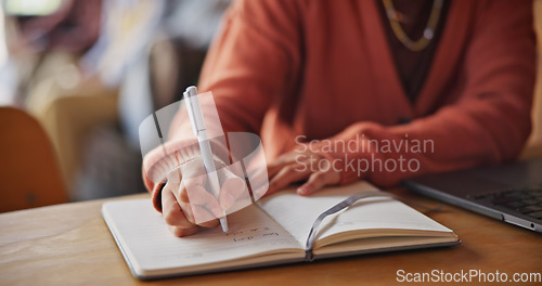 Image of Remote work, planning and hands with a laptop and notebook for research, strategy or goals. Closeup, entrepreneurship and a person writing for creativity, ideas or a list for freelance work with a pc