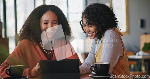 Image of Tablet, laugh and girl friends in a coffee shop watching a funny, comic or comedy video online. Happy, smile and young women networking on social media with digital technology in a cafe or restaurant