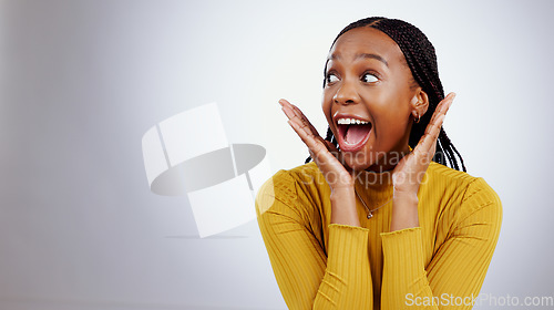 Image of Surprise, wow and black woman with mockup in studio for announcement, news or promo on grey background. Omg, emoji and excited African female model with secret, deal or prize giveaway, lotto or info